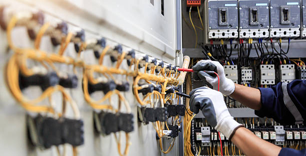Professional Electrician technician working in Lely Resort, FL